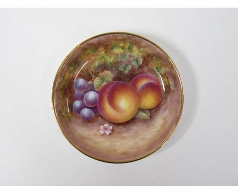 A Royal Worcester style pin dish painted in polychrome enamels with peaches and grapes by M.E. Morris. Signed piece with no f