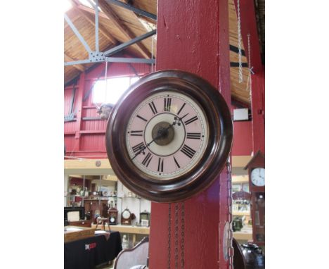 A Victorian postman's alarm clock with weights and pendulum