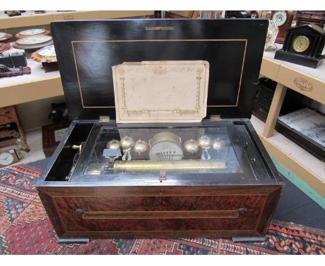 A 19th Century Swiss cylinder music box with burr wood and rosewood casing, playing eight airs, with drum and six bells