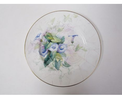 A circular large cabinet plate painted with convolvulus and spiders webs, signed by Royal Worcester artist, Kitty Blake (an e