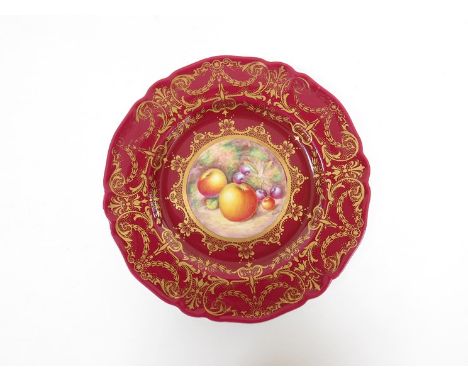 A modern Royal Worcester bone china plate, centrally painted in polychrome enamels with apples and cherries by Telford, with 