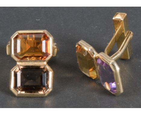 Paar Manschettenknöpfe. 14 kt Gold, ca. 10,33 g, besetzt mit Amethyst, Citrin und Rauchquarz.