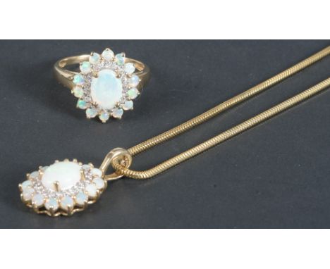 Zweitlge. Schmuckgarnitur: Schlangenkette mit Anhänger und Damenring. 14 kt Gold, ca. 12,2 g, je besetzt mit Opal und Diamant