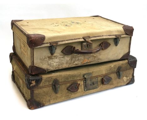 Two vintage canvas covered suitcases, with leather corners, 68cm and 61cm wide (2) 