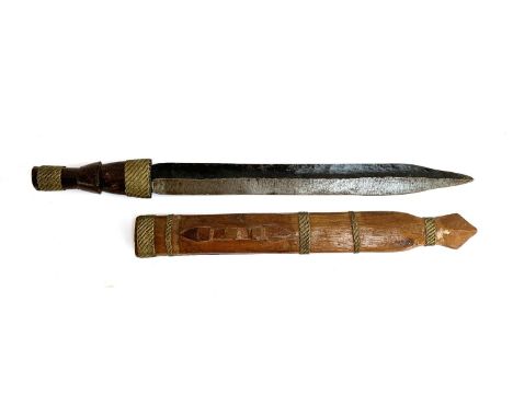 An African, possibly Zulu dagger with wooden and brass handle and scabbard, dagger 51.5cmL, blade 38cmL 