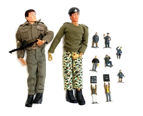 A vintage 1964 Palitoy Action Man in army uniform with boots and gun, together with a 2007 Action Man in similar attire, with