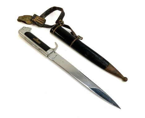 An Italian Milizia Volontaria Sicurezza Nazionale (M.V.S.N.) dagger, the handle with stylised eagle head at the end and brass