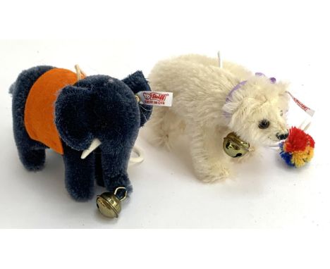 Two miniature Steiff teddy bears, white standing bear with bell collar and elephant with bell to trunk (2) 