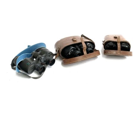 A cased set of Newbold &amp; Bulford Britannia 8x43mm binoculars in hard leather case, together with a further vintage set of