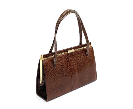 A circa 1970's Mappin &amp; Webb lizard skin handbag, fully lined with tan leather and with signature M &amp; W initial clasp