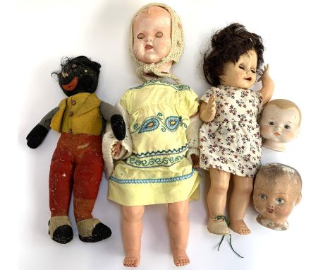 A small quantity of vintage dolls to include Palitoy with patent no. 535811, a further doll, doll's head etc 