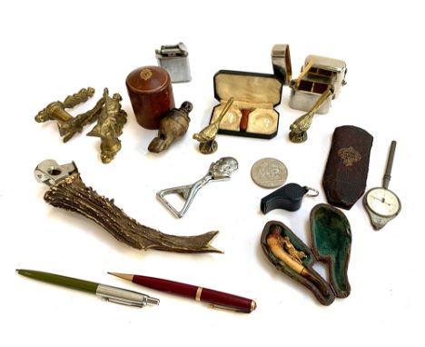 Mixed lot to include stud box; turned wood whistle; various lighters; vintage contact lenses' miniature Meerschaum pipe carve