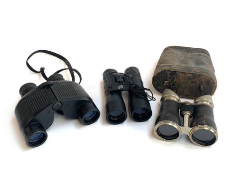 A pair of vintage binoculars in leather case; together with two other pairs (3) 