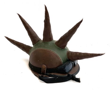 A novelty faux leather spiked mohawk helmet and goggles 