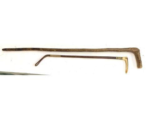 A child's hunting whip with antler grip, 56cmL, together with an ash walking cane 