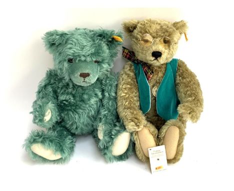 A Steiff 1920 classic teddy bear with yellow ear tag, 35cmH, together with a green Steiff bear with yellow ear tag 