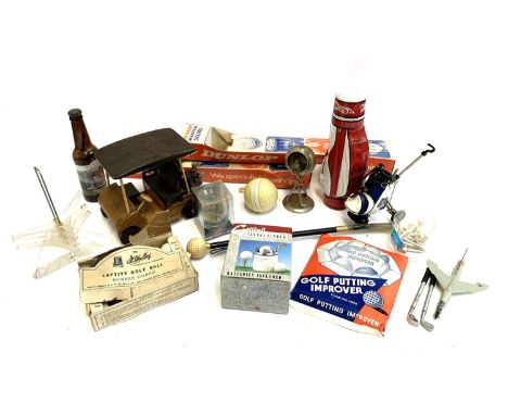 Golf interest, a mixed lot of mainly novelty golf items, to include plated ashtray, wooden golf caddy model, tees, vintage Du