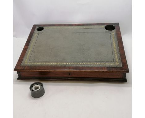 Antique mahogany writing slope with tooled grey leather top missing its original ink wells but does have an antique pewter in