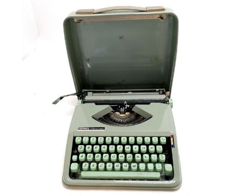 Hermes Rocket green typewriter in original carry case - 30cm x 32cm.In good working condition but needs a new ribbon