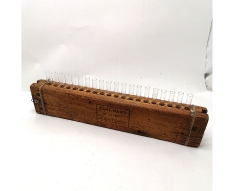 Wooden cigar roller by Karl Hart No 34163 and now contains 20 glass test tubes for floral display 