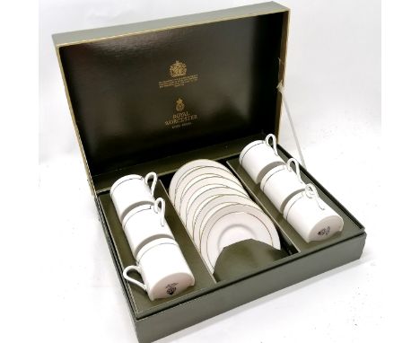 Boxed set Royal Worcester coffee cans and saucers in unused condition 