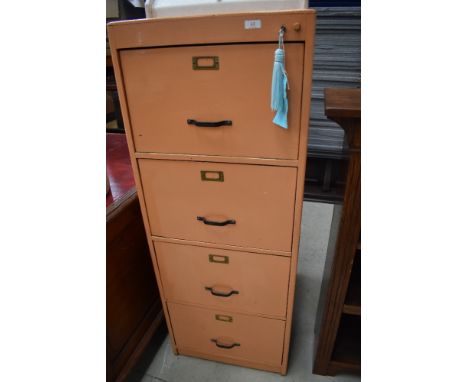 A vintage wooden four drawer filing cabinet, having interesting push button release, painted orange, approx. dimensions W50cm