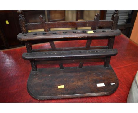 A vintage pipe rack, approx. width  47cm