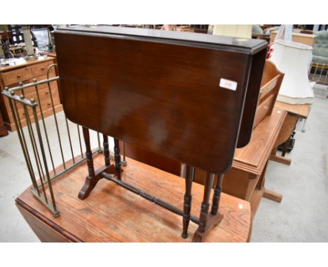 An early 20th century mahogany sutherland table of traditional drop leaf design, on turned gate legs