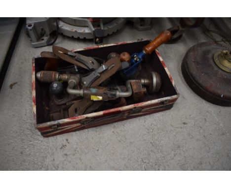 A small selection of vintage tools, including planes