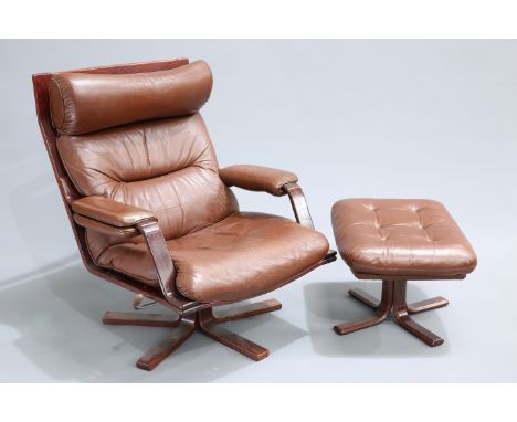 A 1970'S BROWN LEATHER AND BENTWOOD SWIVEL CHAIR AND FOOTSTOOL, adjustable, the stool with button seat, unsigned. (2)