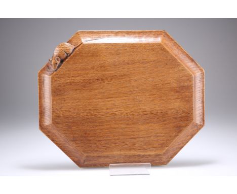 ROBERT THOMPSON OF KILBURNA MOUSEMAN ADZED OAK BREADBOARD, CIRCA 1980, of canted rectangular form, with carved mouse signatur
