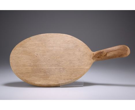 ROBERT THOMPSON OF KILBURNA MOUSEMAN OAK CHEESEBOARD, the adzed oval board with carved mouse signature to the handle. 37cm ac
