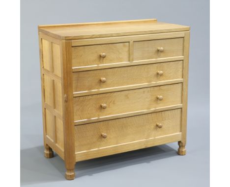 ROBERT THOMPSON OF KILBURNA MOUSEMAN OAK CHEST OF DRAWERS, the adzed top above two short over three long graduated drawers, e