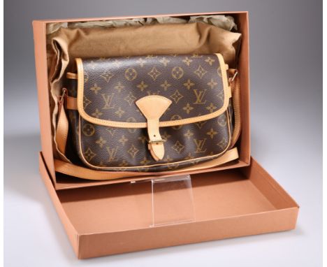 LOUIS VUITTON SOLOGNE SHOULDER BAG, in monogrammed canvas with light tan trim and shoulder strap, 27cm by 18cm by 8cm, with o