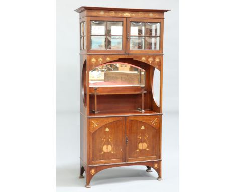 AN ART NOUVEAU INLAID MAHOGANY CABINET, IN THE MANNER OF SHAPLAND &amp; PETTER, the flat projecting cornice above a frieze in