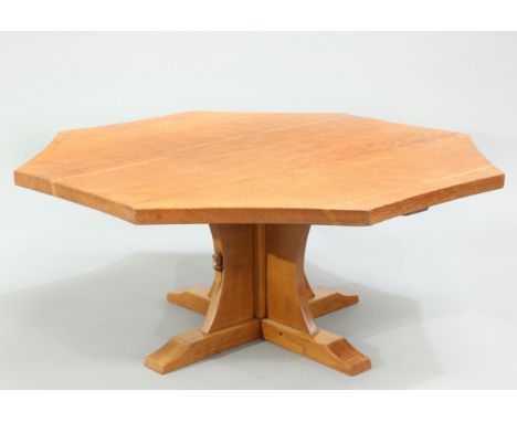 ROBERT THOMPSON OF KILBURNA LARGE MOUSEMAN OAK OCCASIONAL TABLE, CIRCA 1980, the adzed top raised on a quad form base, with c