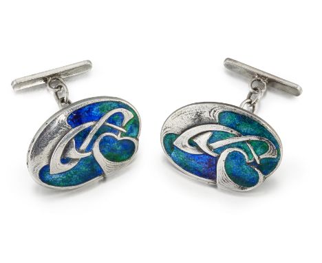 ARCHIBALD KNOX (1864-1933)FOR LIBERTY & CO, A PAIR OF CYMRIC SILVER AND ENAMEL CUFFLINKS, of oval form, with whiplash scroll 