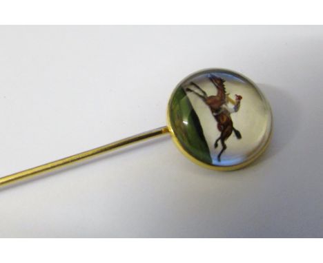 14ct gold reverse crystal intaglio stick pin of a horse and jockey