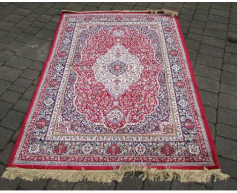 Red ground Cashmere rug with traditional medallion design 200 cm x 140 cm