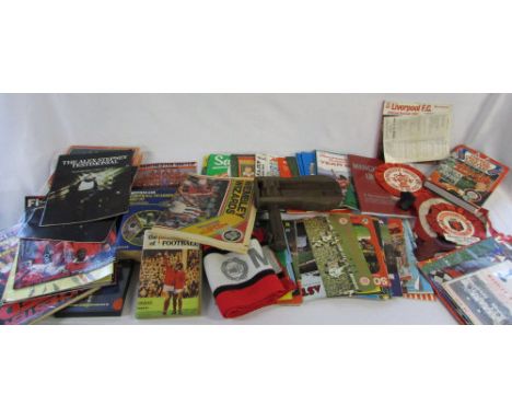 Various football memorabilia mainly Manchester United including programmes, books, scarf, cd, rosettes & a wooden ratchet