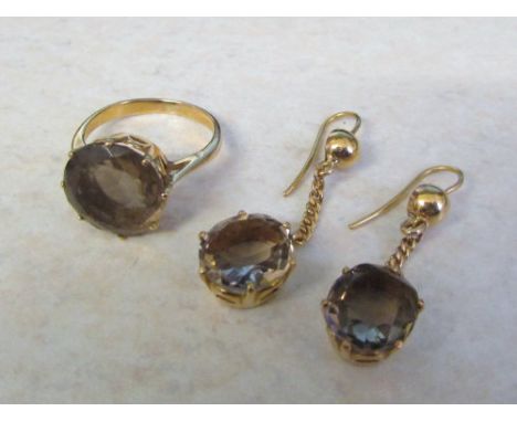 Tested as 15ct gold smokey quartz ring, size K/L and earrings total weight 10.1 g