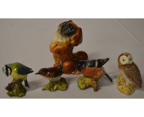 4 Beswick ceramic bird figures and a Beswick dog