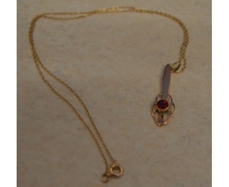 An unusual 9ct gold and synthetic ruby drop pendant on 9ct gold chain, total approx weight 2.8g