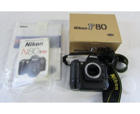 Nikon F80 camera complete with box, instructions and battery pack