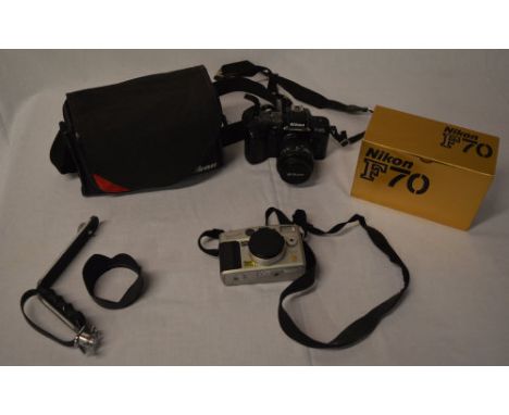 Nikon F70 camera body, Nikon F-401S camera, Panasonic DMC-LC5 and various accessories