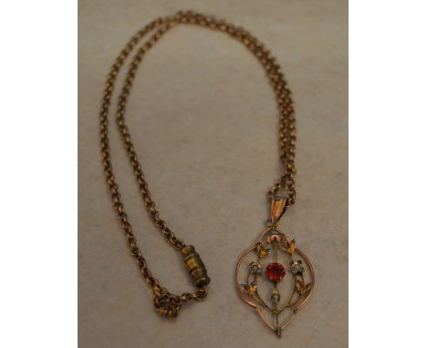 9ct gold drop pendant with a synthetic ruby and seed pearl on a 9ct gold chain, total approx weight 6.1g