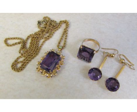 Tested as 18ct gold with synthetic alexandrite ring size N (stone size 16 mm x 8 mm), earrings and necklace with pendant (sto