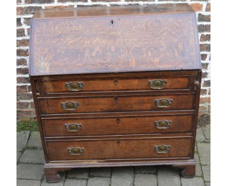 Georgian oak bureau with replacement handles on bracket feet & walnut cross banding