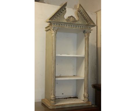 A George III style gilt and grey distressed painted wall shelf with broken arch surmount, three shelves and column uprights 5