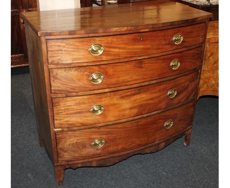A George III mahogany bowfront chest of four graduated drawers with oval brass drop handles, on bracket feet (a/f) 108cm